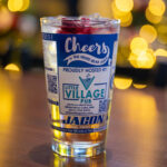 Raspberry fizz cocktail with pear vodka and suro elderflower liquer